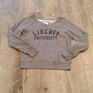 Red shirt woman’s liberty university sweatshirt
